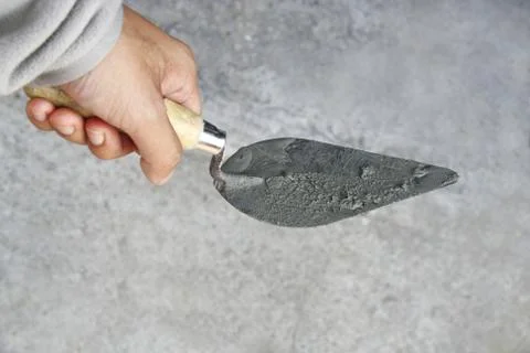 Hand hold construction trowel Stock Photos