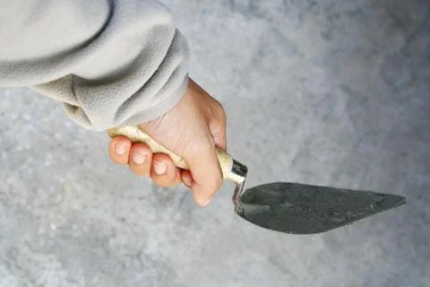 Hand hold construction trowel Stock Photos