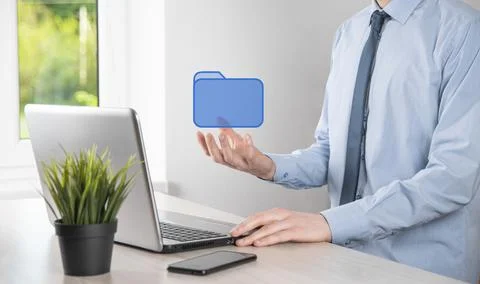 Hand hold folder icon.Document Management System or DMS setup by IT consultan 写真素材