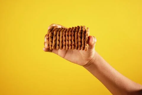 Hand hold stack of chocolate cream cooking 스톡 사진
