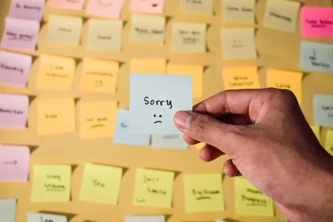 Hand hold sticky notes with words sorry, Motivational for personal development, Stock Photos