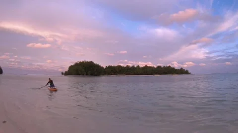 Hand hold still view from Muri Beach Cook Islands to Koromiri islets within lago Stock Footage 235322402