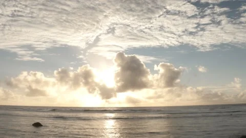 Hand hold still view of sunset at black rock of north east Cook Islands look out Stock Footage 235306978