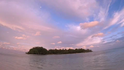 Hand hold super wide angle view from Muri Beach Cook Islands to Koromiri  islets Stock Footage 235322268