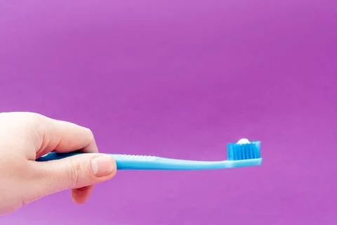 Hand Hold Toothbrush Paste Smeared, creative copy Space, Healthy Mouth Concep Stock Photos