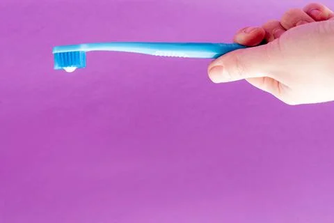 Hand Hold Toothbrush Paste Smeared, creative copy Space, Healthy Mouth Concep Stock Photos
