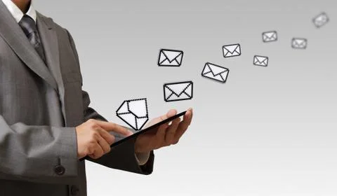 Hand hold touch screen computer and pixel e-mail icon Stock Photos