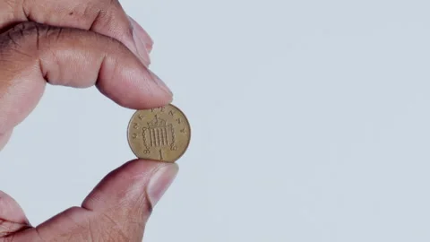 Hand Holding 1 Penny Back Stock Footage 248758794