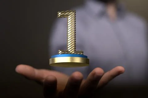 Hand holding a 3D render of a first place trophy 스톡 사진