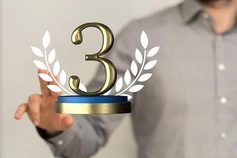 Hand holding a 3D render of a third place trophy 스톡 사진