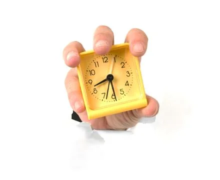 Hand holding alarm clock Stock Photos