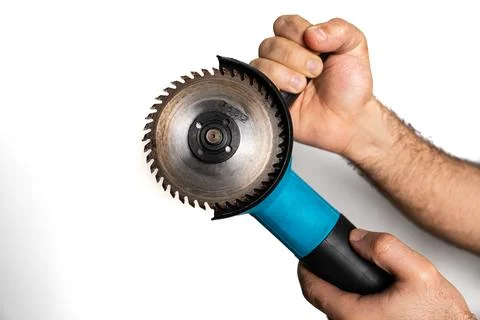 Hand Holding Angle Grinder with Cutting Disc Stock Photos