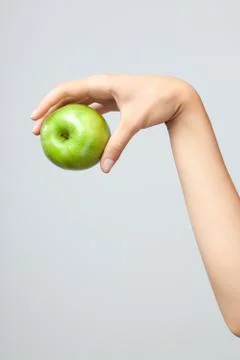 Hand holding apple. Stock Photos