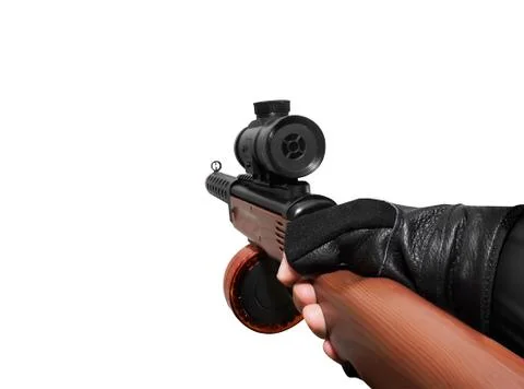 Hand holding automatic gun. Stock Photos