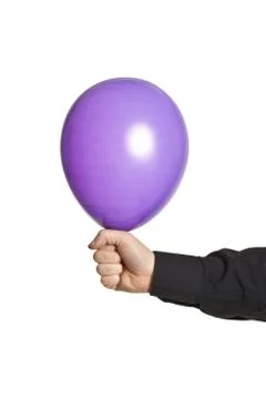 Hand holding baloonn Stock Photos