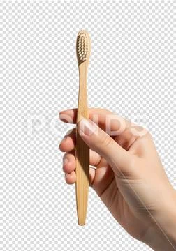 Hand holding bamboo toothbrush, eco-friendly dental care PSD Template
