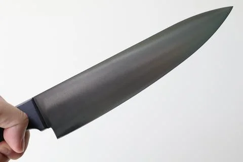 Hand holding basic chef knife, Kitchen knives for cooking Stock Photos