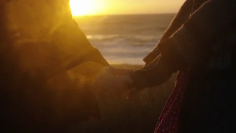 Hand Holding at the Beach 스톡 동영상 85451242