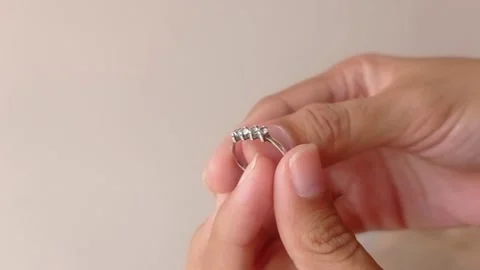 Hand holding a beautiful ring  Stock Footage 146255249