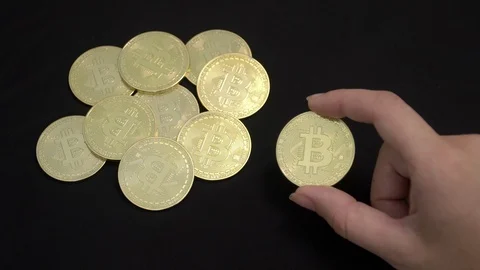 Hand Holding Bitcoin Video stock 92506751