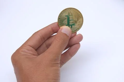 Hand holding bitcoin Stock Photos