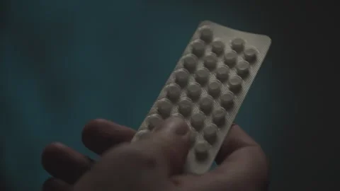 Hand Holding Blister Pack of Pills. Stock Footage 278513685