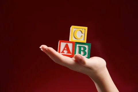 Hand holding blocks Stock Photos