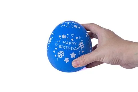 Hand holding a blue egg shaped kitchen timer isolated on white background Stock Photos