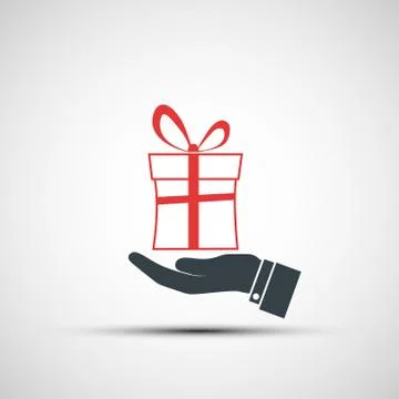 Hand holding a box with a gift. Illustrazione stock