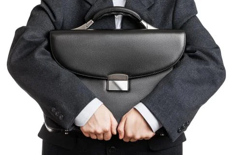 Hand holding briefcase Stock Photos