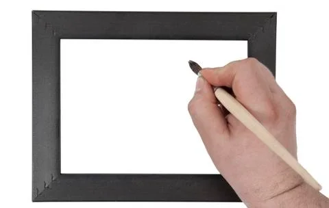 Hand holding  brush on  background of the scope Stock Photos