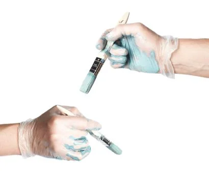 Hand holding a brush Stock Photos