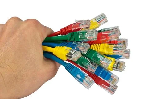Hand Holding Bunch of Colored Network Cables Isolated Foto stock