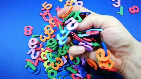 Hand holding bunch of numbers Stock Footage 91374382