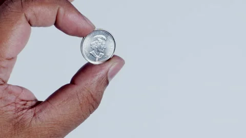 Hand Holding Canada 5 cents Head Stock Footage 248758124