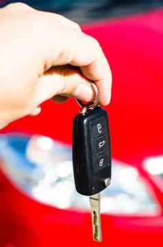Hand holding a car key Stock Photos
