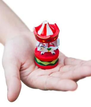 Hand holding carousel Stock Photos