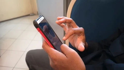 Hand holding cell phone is browsing the internet. Stock Footage 95826641