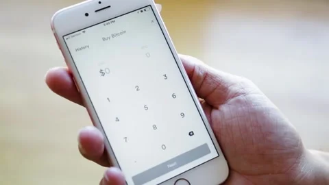 A hand holding a cell phone Stock Footage 155535835