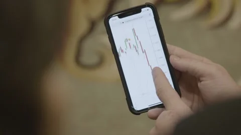 A hand holding a cell phone Stock Footage 155538410