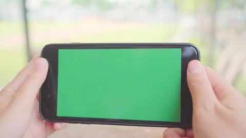 A hand holding a cell phone Vídeo Stock 157862733