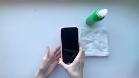 A hand holding a cellphone Stock Footage 129600864