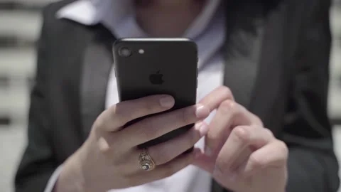 A hand holding a cellphone Stock Footage 155539059