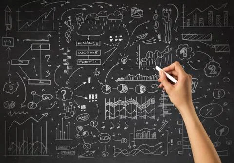 Hand holding chalk Stock Photos