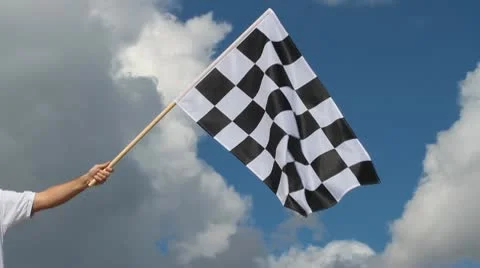 Hand holding a checkered flag Stock Footage