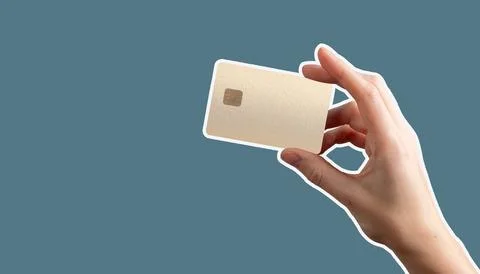 Hand holding chip enabled card conveys smooth payment process, income flow, a Stock Photos