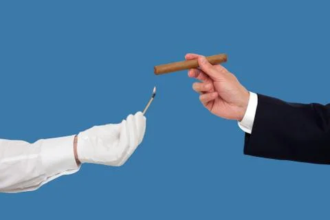 Hand holding a cigar Stock Photos