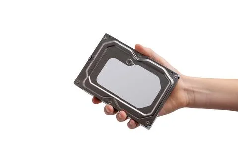 Hand holding closed hard disk drive against white background, computer stor.. Foto stock