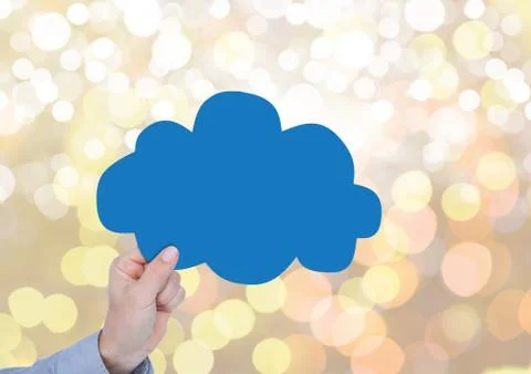 Hand holding cloud with sparkling light bokeh background Stock Photos