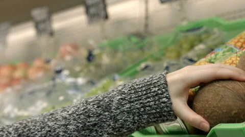 Hand holding a coconut Stock Footage 67981039